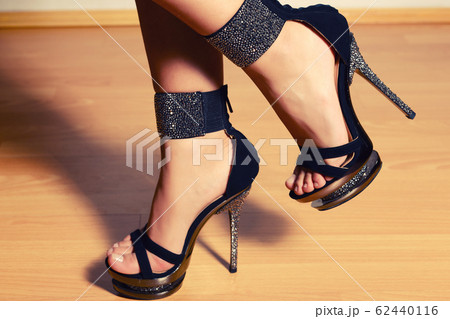 girl in a chic black sandals with high heels girl in a chic black sandals with high heels 62440116