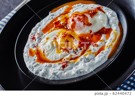 cilbir, poached eggs in dill yogurt sauce cilbir, poached eggs in dill yogurt sauce 62440472