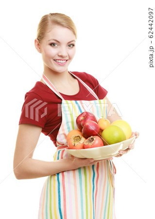 housewife or seller offering healthy fruit 62442097