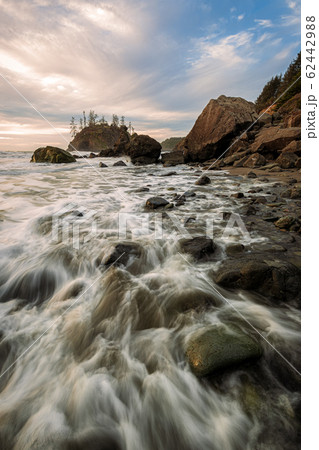 Evening Sunset at a Tropical Rocky Beach Evening Sunset at a Tropical Rocky Beach 62442988