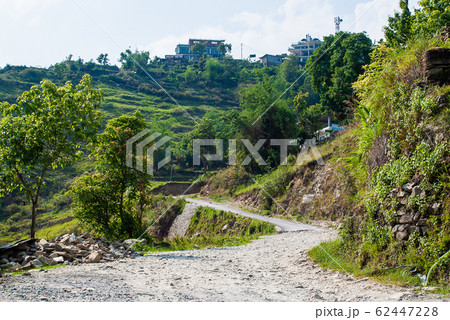 Country serpentine road in mountains, Pokhara, Nepal 62447228