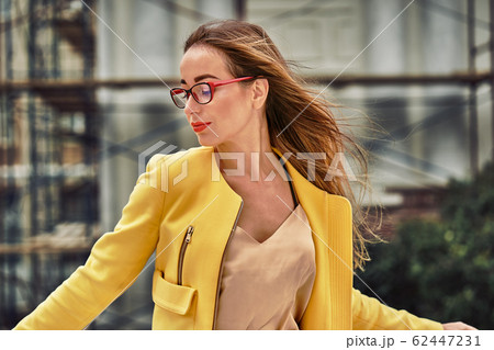 Portrait of a young beautiful laughing woman 62447231