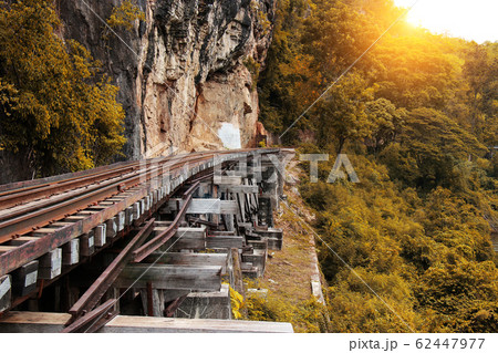 Train ride on the Death railway (river Kwai, Thailand). Death Railway train passing over the Tham Krasae Viaduct. Thai-Burma Railway 62447977