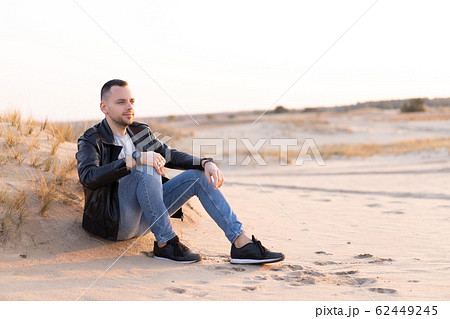 Young Caucasian man dressed black leather jacket Young Caucasian man dressed black leather jacket 62449245