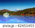 Red torii gate on the shore of Lake Ashi, near Mount Fuji in Hakone, Japan. 62451453