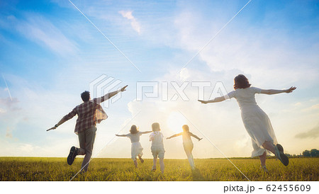 Happy family on summer walk 62455609