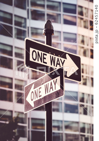 Retro stylized picture of one way street signs in 62457140