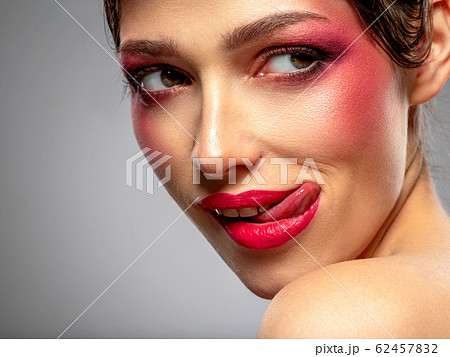 Beautiful sexy girl with bright eye makeup. Beautiful sexy girl with bright eye makeup. 62457832