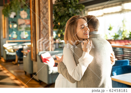 Couple Greeting In Cafe Couple Greeting In Cafe 62458181
