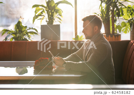 Man Waiting For Woman In Cafe Man Waiting For Woman In Cafe 62458182