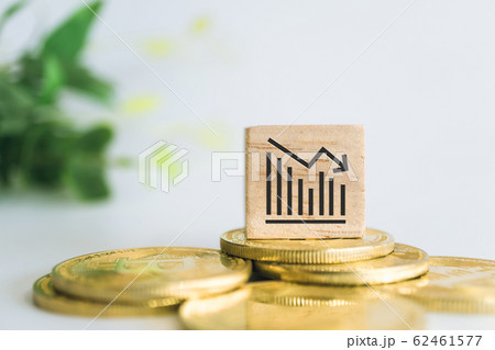 Graph chart going down bearish sign on wooden cube 62461577