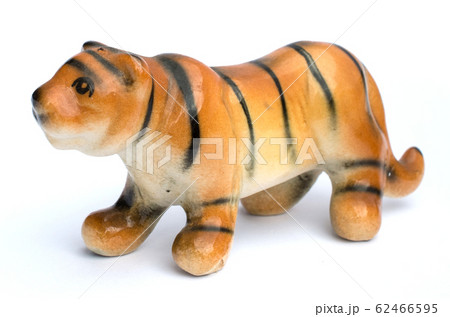 The tiger clay dolls for decoration, one of the souvenir from the local village in Lampang province of Thailand. 62466595