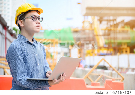 Young asian engineers are working on the construction site 62467102