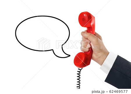 Telephone receiver in hand and speech bubble Telephone receiver in hand and speech bubble 62469577