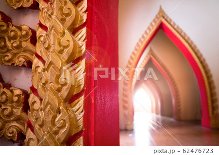 Old ruined arch in ancient temple at sunset with lens flare effect. detail of architecture of traditional temple in Thailand , Southeast Asia Old ruined arch in ancient temple at sunset with lens flare effect. detail of architecture of traditional temple in Thailand , Southeast Asia 62476723