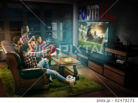 Group of friends watching TV, football match in France, sport games Group of friends watching TV, football match in France, sport games 62479273