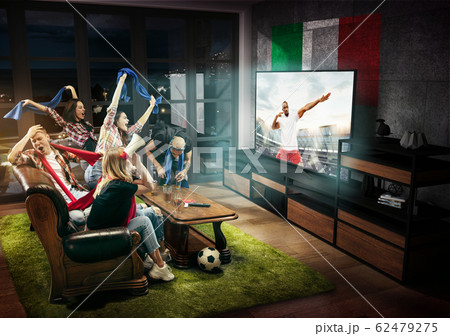 Group of friends watching TV, football match in Italy, sport games Group of friends watching TV, football match in Italy, sport games 62479275