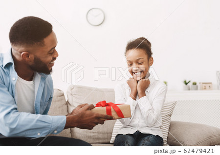 Birthday girl. Dad making gift for daughter Birthday girl. Dad making gift for daughter 62479421