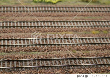 Toy Railroad tracks on the background of nature 62480823