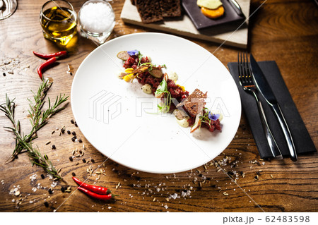 Steak tartare served on a plate in restaurant 62483598