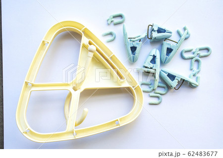 Broken clothespin or Clothes rack on white background, Close up shot, Laundry work concept Broken clothespin or Clothes rack on white background, Close up shot, Laundry work concept 62483677