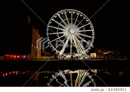 Ferris wheel in the old town of Gdansk Ferris wheel in the old town of Gdansk 62483931