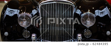 Detail of classic car. Close-up of headlight. 62484395