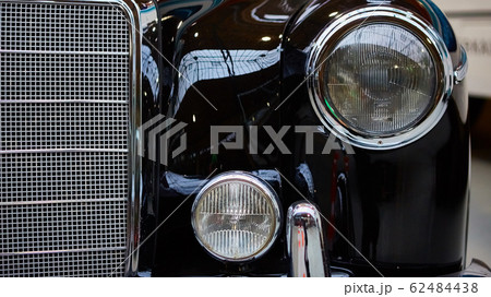 Detail of classic car. Close-up of headlight. 62484438
