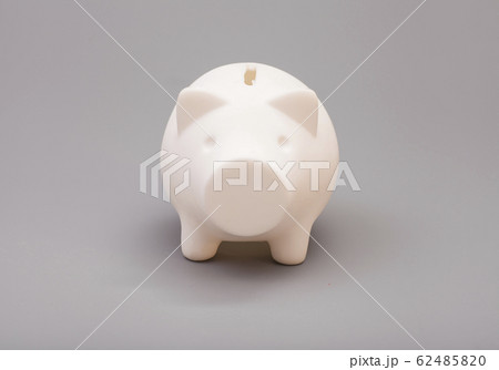 Piggy bank over gray background Piggy bank over gray background 62485820