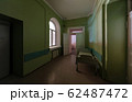 Green corridor with an empty hospital bed in an 62487472