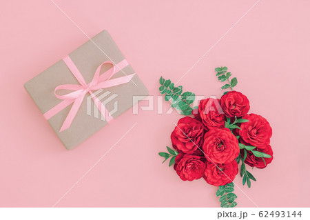 Gift or present box wrapped in kraft paper and 62493144
