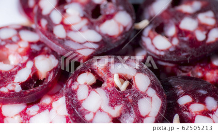 The maggots crawl on the spoiled sausage, disgusting unsanitary The maggots crawl on the spoiled sausage, disgusting unsanitary 62505213