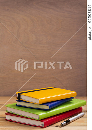 notepad or paper notebook at wooden table notepad or paper notebook at wooden table 62508816