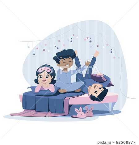 Three cheerful kids of diverse race in blue nightwear lie on the bed, having pajama party. Sleepover and slumber party concept. Print advertisement. Three cheerful kids of diverse race in blue nightwear lie on the bed, having pajama party. Sleepover and slumber party concept. Print advertisement. 62508877