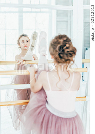 Beautiful graceful ballerina practice ballet Beautiful graceful ballerina practice ballet 62512613