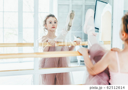 Beautiful graceful ballerina practice ballet Beautiful graceful ballerina practice ballet 62512614