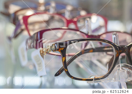 eyeglass frames on the counter of a specialty store eyeglass frames on the counter of a specialty store 62512624