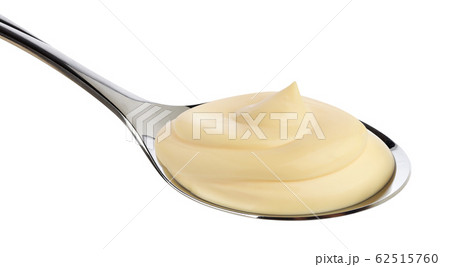 Mayonnaise in spoon isolated on white background Mayonnaise in spoon isolated on white background 62515760