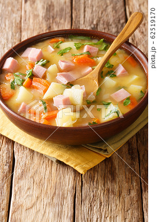 Spicy hot pea soup with potatoes, onions, carrots 62519170
