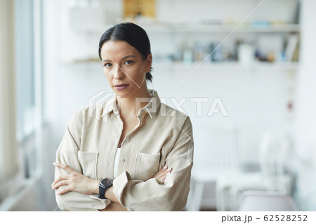 Young businesswoman at office Young businesswoman at office 62528252