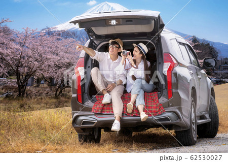 Asian couple travel Fuji mountain by suv car Asian couple travel Fuji mountain by suv car 62530027