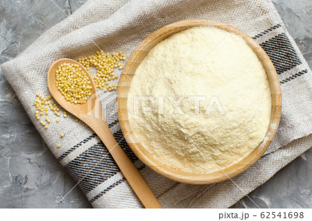 Hulled millet flour and grain top view Hulled millet flour and grain top view 62541698