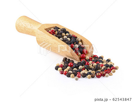 Tri colors peppercorns  in wooden spoon on white 62543847