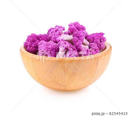 Purple cauliflower in wooden bowl on white Purple cauliflower in wooden bowl on white 62545415