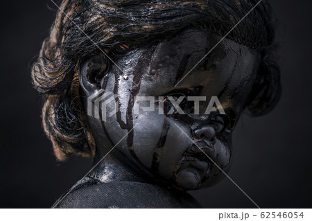 Creepy bloody doll in the dark Creepy bloody doll in the dark 62546054