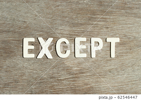 Alphabet letter in word except on wood background Alphabet letter in word except on wood background 62546447