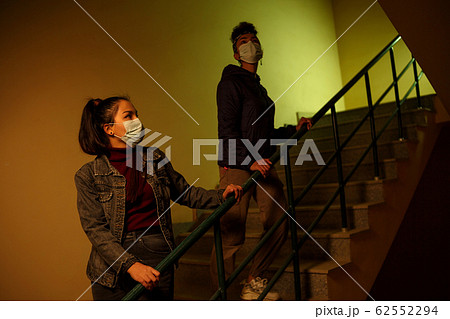 a young Asian and African girl in disposable a young Asian and African girl in disposable 62552294