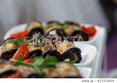 Eggplant rolls with nuts. Caucasian cuisine. Vegetarian food. Eggplant rolls with nuts. Caucasian cuisine. Vegetarian food. 62552854