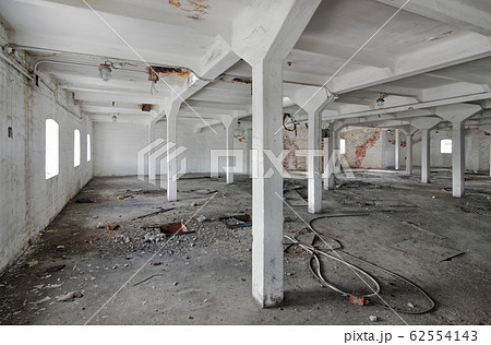 Empty industrial room of an old abandoned factory Empty industrial room of an old abandoned factory 62554143