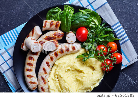 French food cheesy potato aligot with sausages French food cheesy potato aligot with sausages 62561585